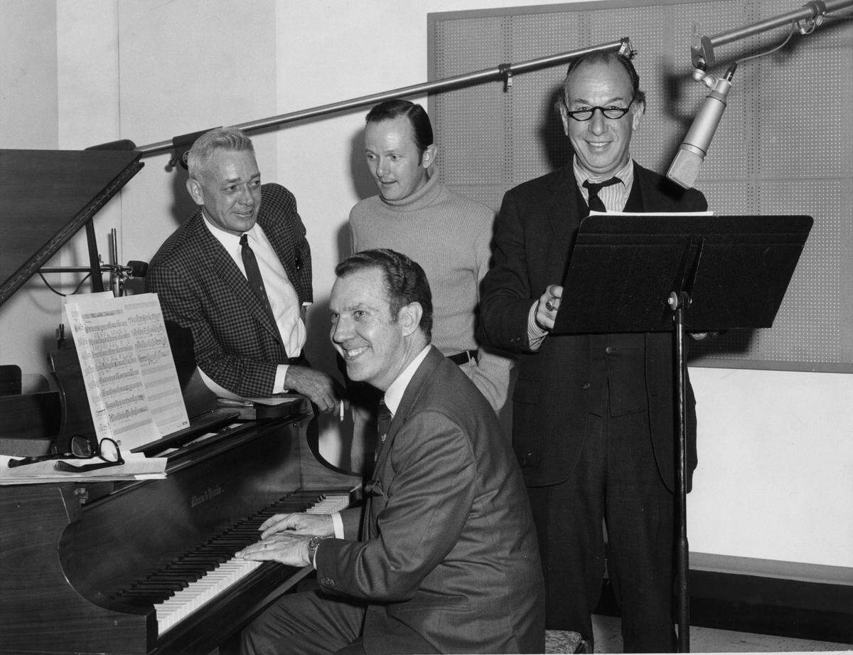 Loonis McGlohon, seated, Creighton Spivey, left, Jim Lackey, center, and Jose Fenner, right, in a  1969 file photo