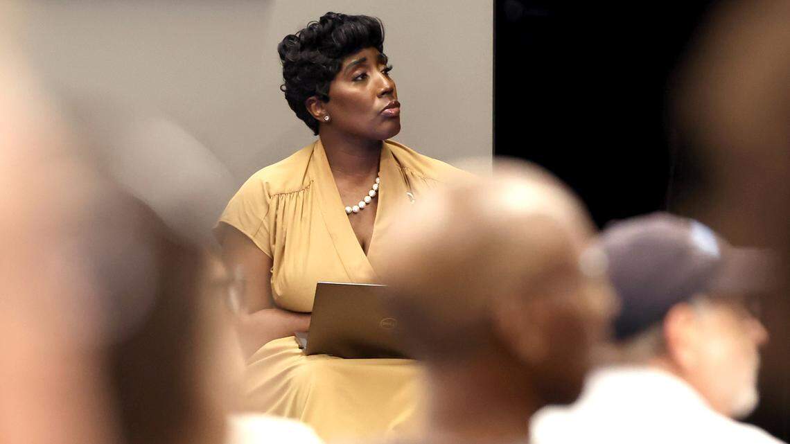 Charlotte City Council member Tiawana Brown listens to a presenters presentation during a town hall meeting at Good Shepherd Church in Charlotte on May 28.