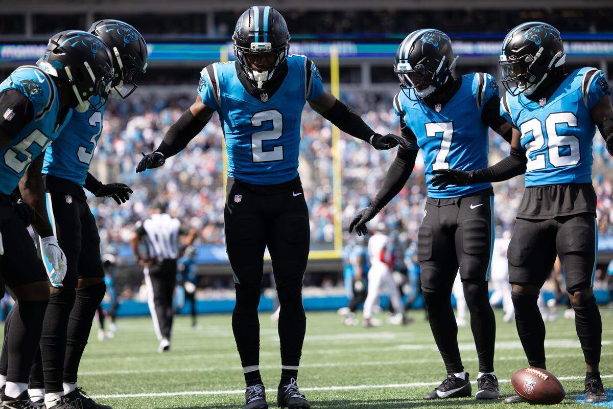 Carolina Panthers cornerback Mike Jackson celebrates an interception against the Atlanta Falcons on Sept. 21, 2025, at Bank of America Stadium.