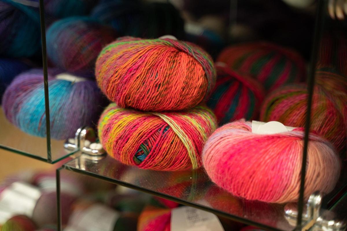 Remi Haygood’s Charlotte Yarn store in Dilworth carries balls and skeins of yarn of every color imaginable.