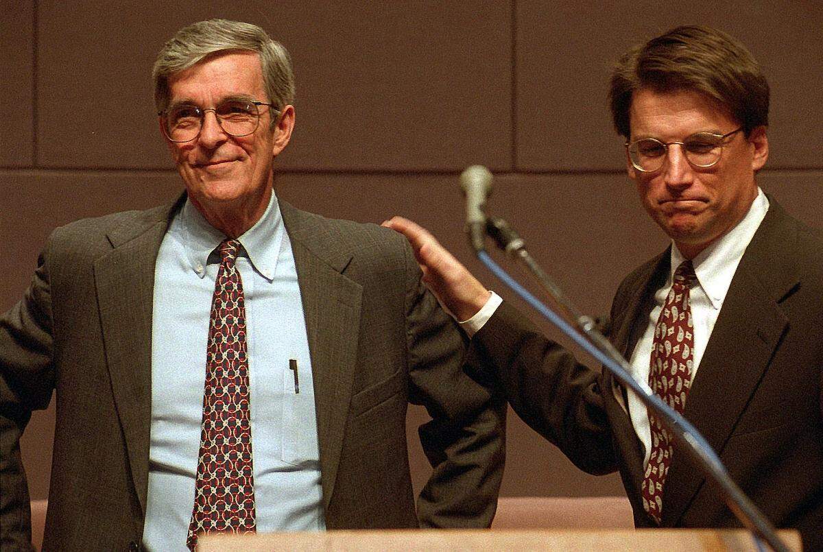 Charlotte Mayor Pat McCrory (right) at a news conference in January 1996.