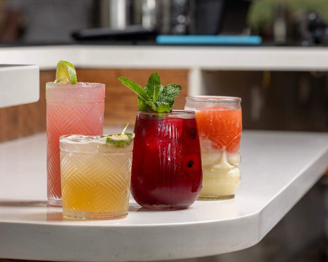 The Bar at Optimist Hall is now open, offering a variety of craft cocktails.