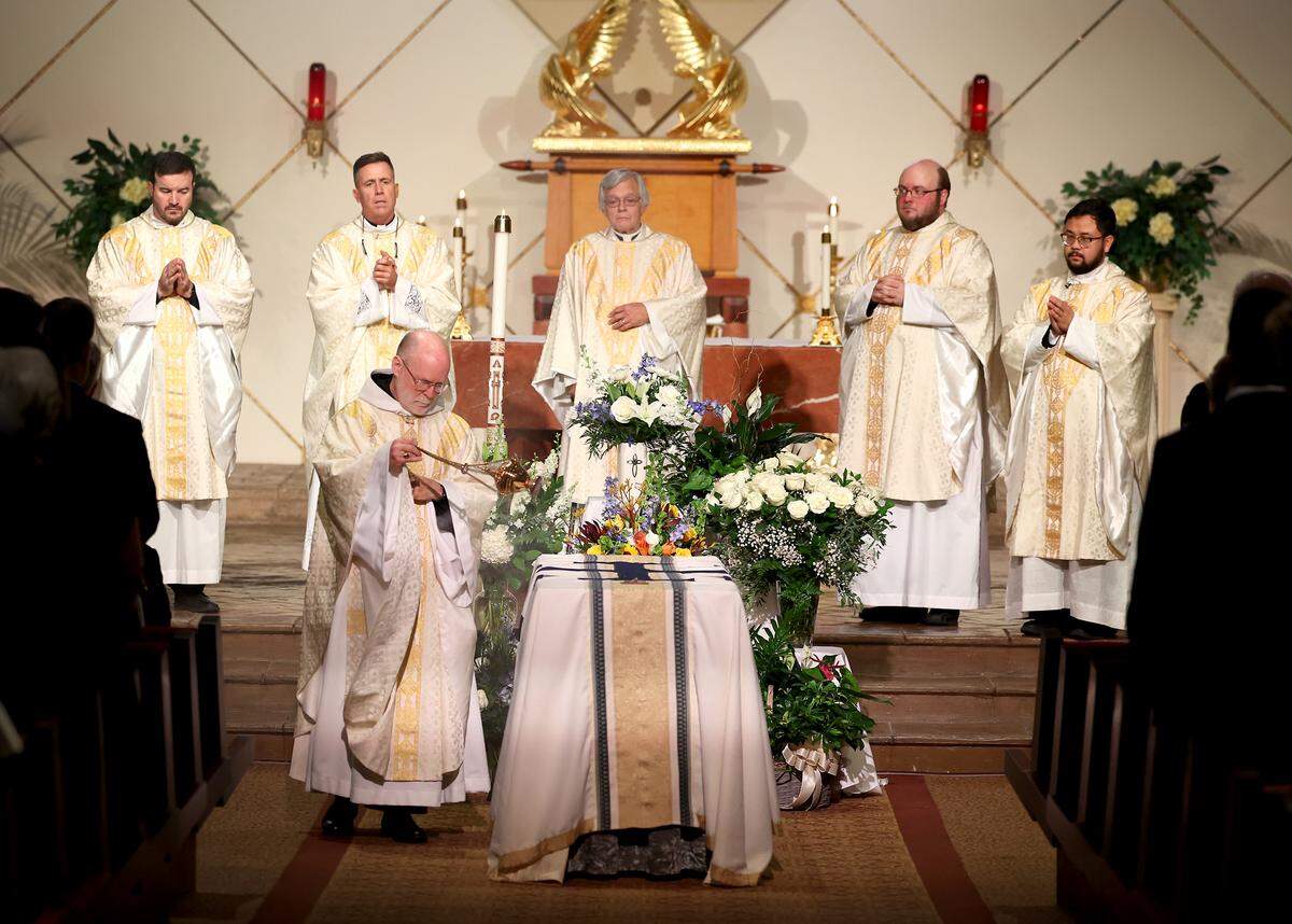 Abbot Placid Solari, a Benedictine monk, spreads incense at the funeral for former longtime Charlotte Motor Speedway president H.A. “Humpy” Wheeler, Jr., on Tuesday, August 26, 2025 at St. Gabriel Catholic Church in Charlotte, NC.Wheeler passed away on August 20, 2025 at the age of 86.Humpy Wheeler was the president of Charlotte Motor Speedway in Concord, NC for more than 30 years. Abbot Solari is Abbot of Belmont Abbey and Chancellor of Belmont Abbey College.