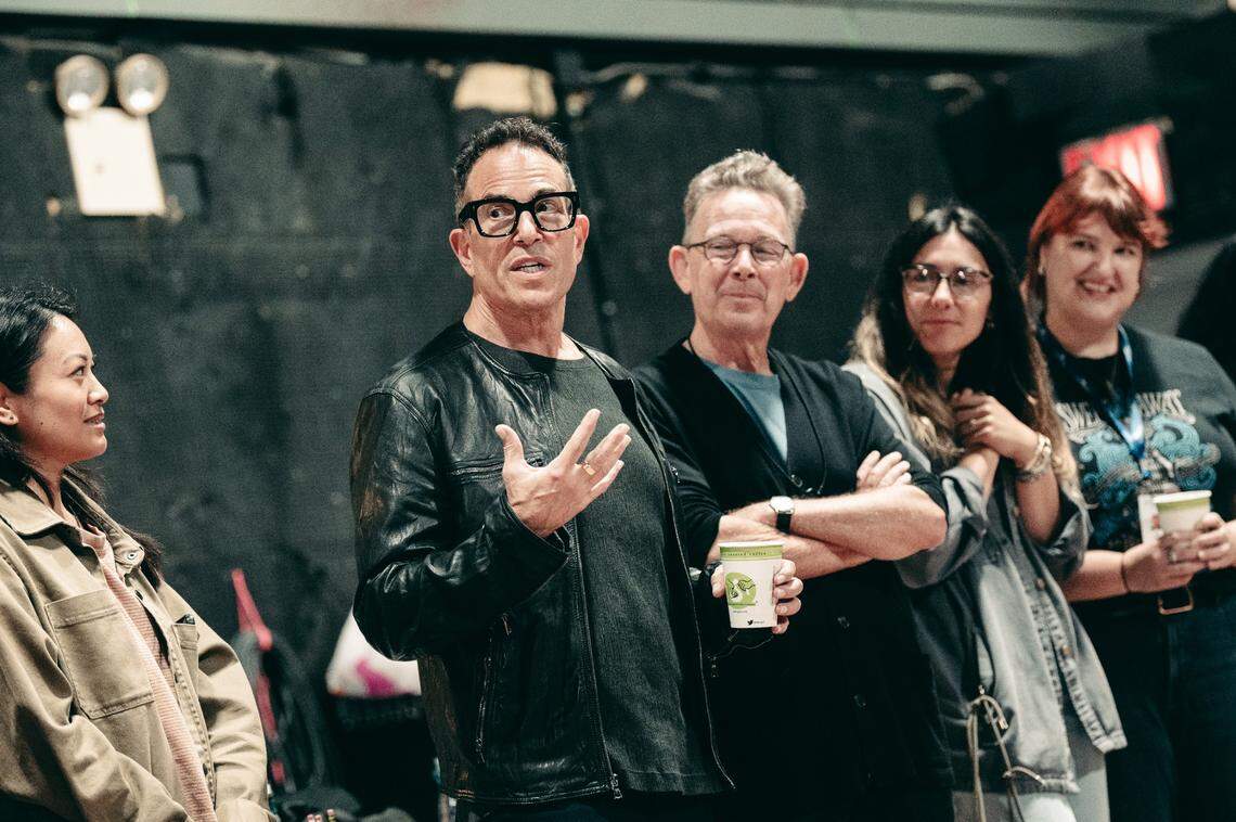 “Swept Away” director Michael Mayer, center left, and the show’s book writer, John Logan, at the first week of rehearsals this week.