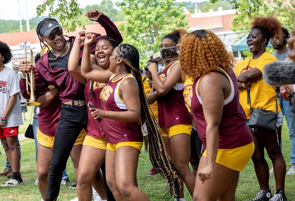One of the West Charlotte band members dances with the crowd at West Charlotte High School as they celebrated Lion Pride Day with the soon to be open new school building in Charlotte, NC on Saturday, April 30, 2022.