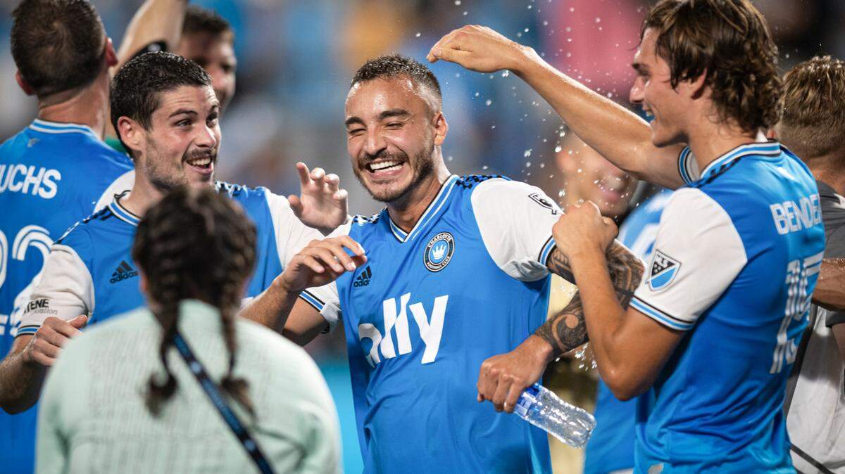 Charlotte FCí’s Sergio Ruiz (6), Andre Shinyashiki (16), and Benjamin Bender (15) celebrate after a 4-1 victory against Nashville SC at Bank of America Stadium in Charlotte, N.C. on Saturday, July 9, 2022.