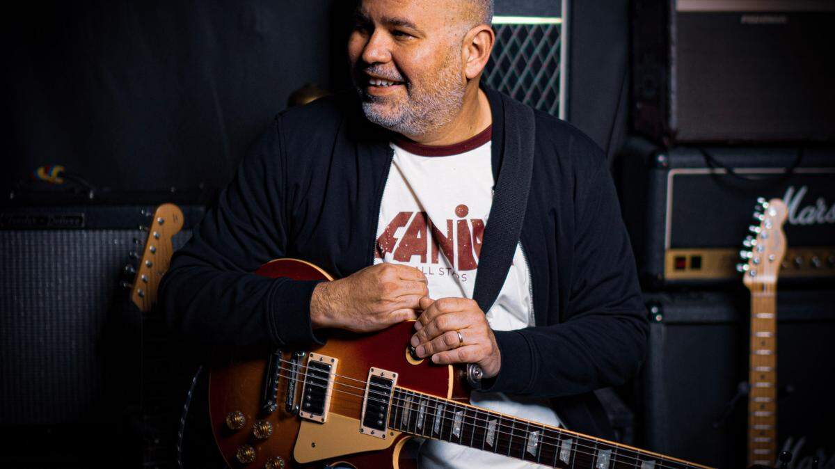 Tony Arreaza founded Charlotte-based Carlotan Talents and is the guitarist in the local Latin band UltimaNota.