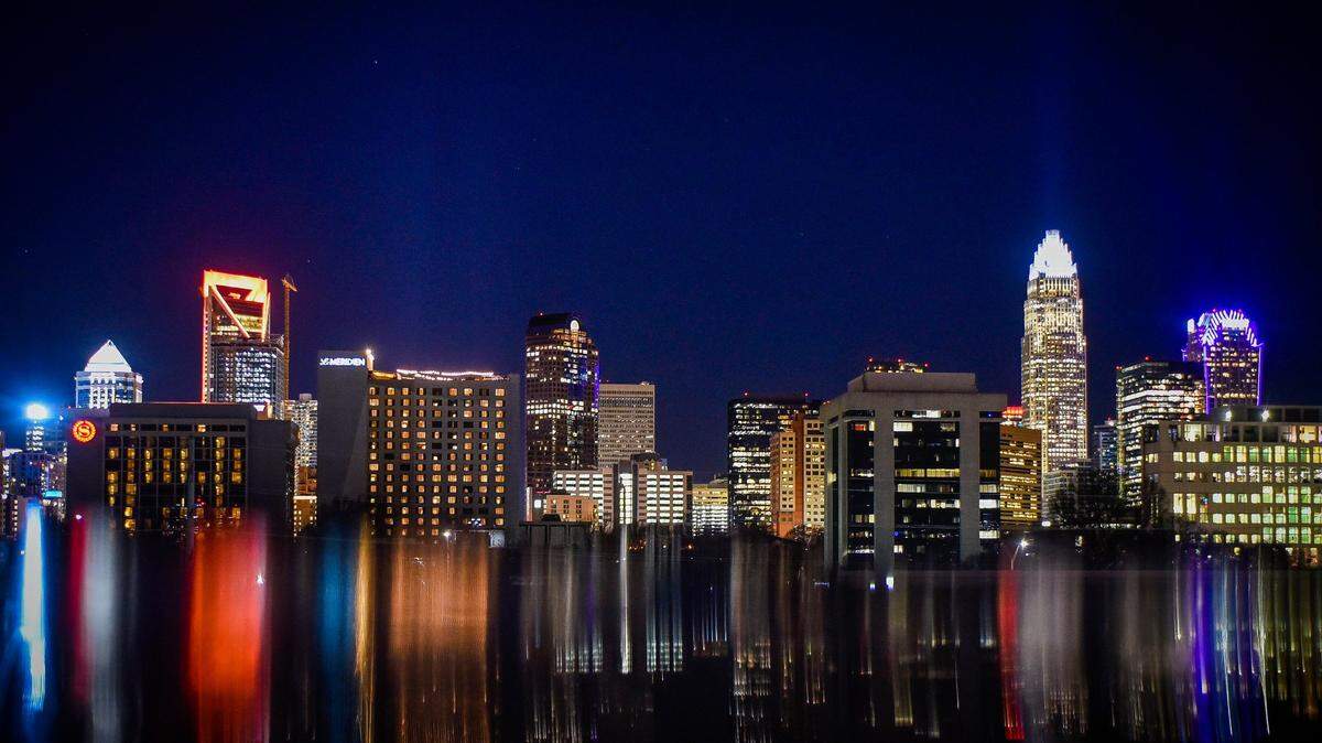 The Charlotte skyline is seen from the Metropolitan Shopping Center on, Tuesday, Feb. 8, 2022.