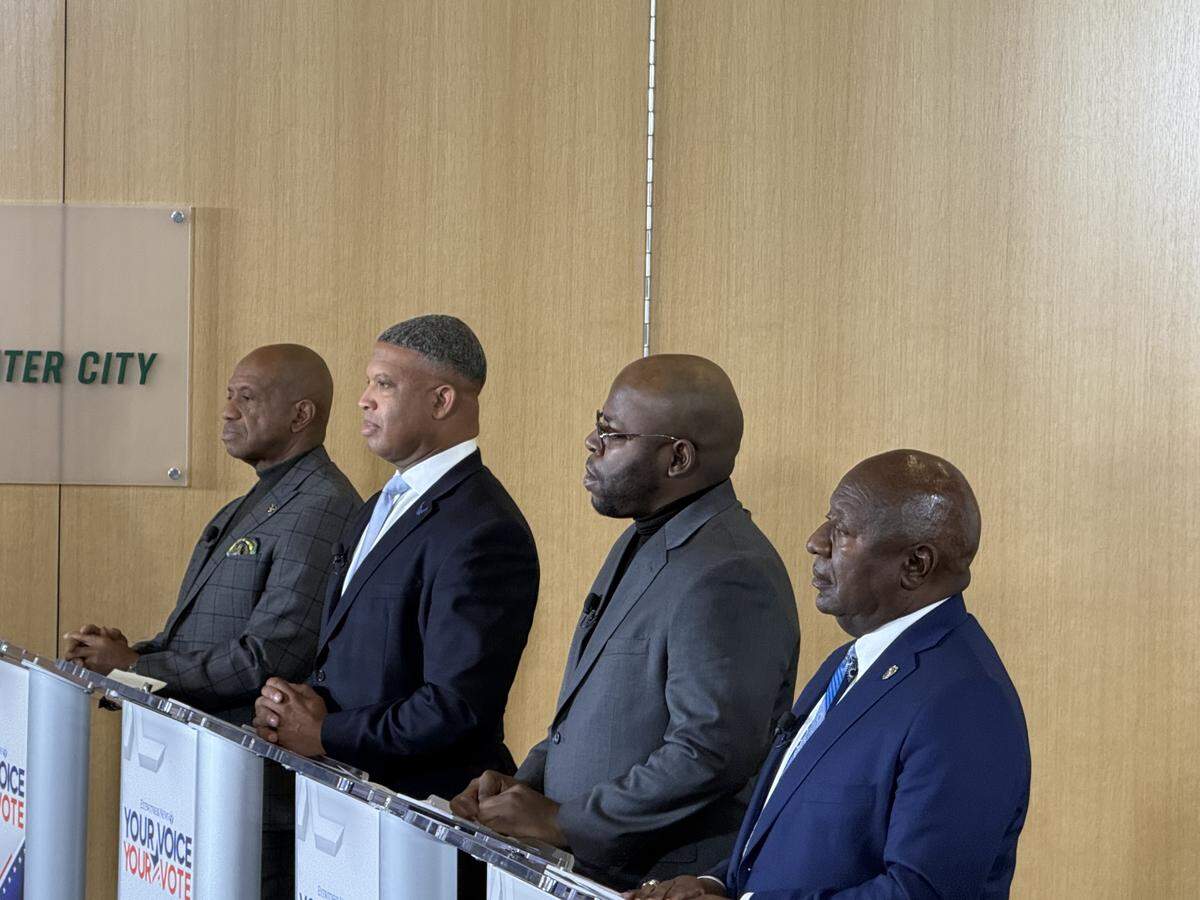 From left: Sheriff Garry McFadden, former chief deputy Rodney Collins, former detention officer Antwain Nance and Charlotte-Mecklenburg Police Sgt. Ricky Robbins before a debate.