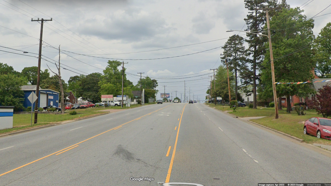 The driver pulled into the turn lane on Westchester Drive in High Point and got out to check on a cat in the road, police say.