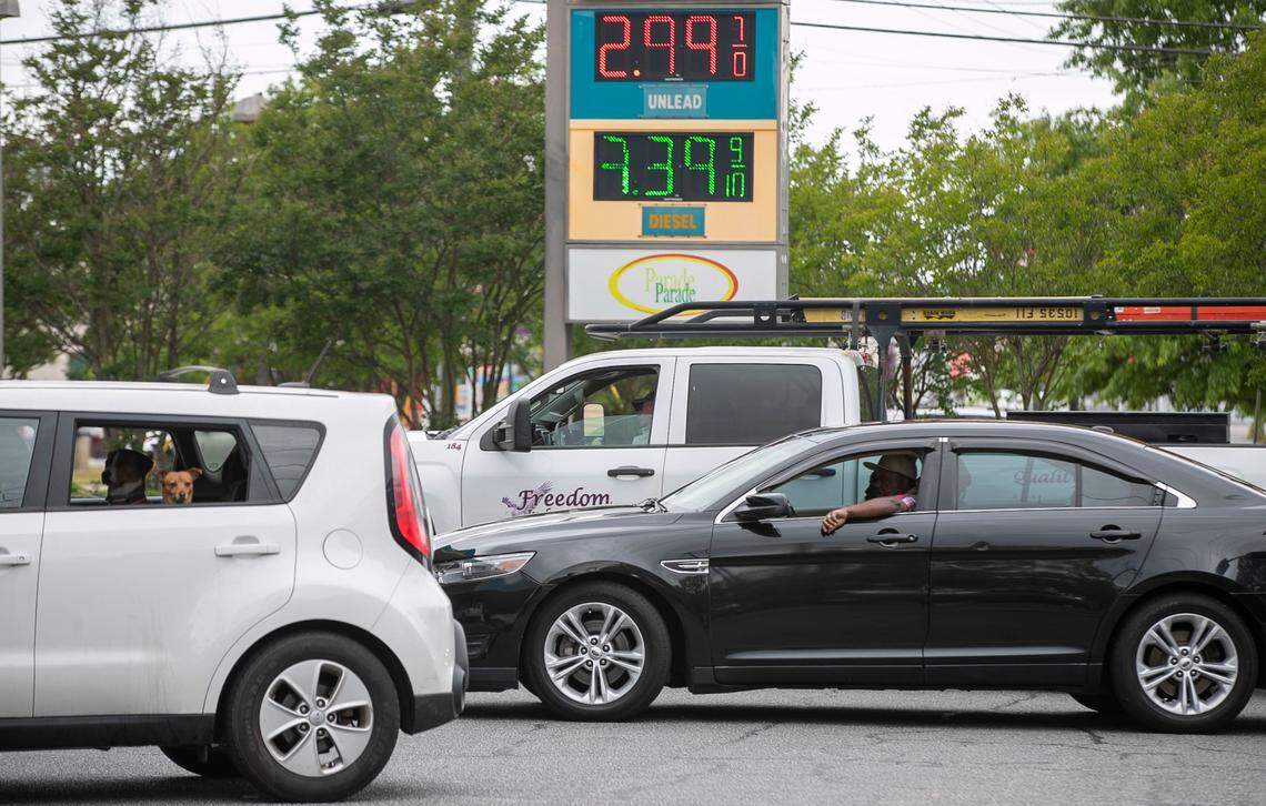 Customers line up for fuel at the at the Valero on Western Blvd. on Tuesday, May 11, 2021 in Tarboro, N.C. Several surrounding stations were without fuel on Tuesday morning, forcing customers to wait in line for about 15 minutes to fill their tanks due to the closure of the Colonial Pipeline by a cyberattack.