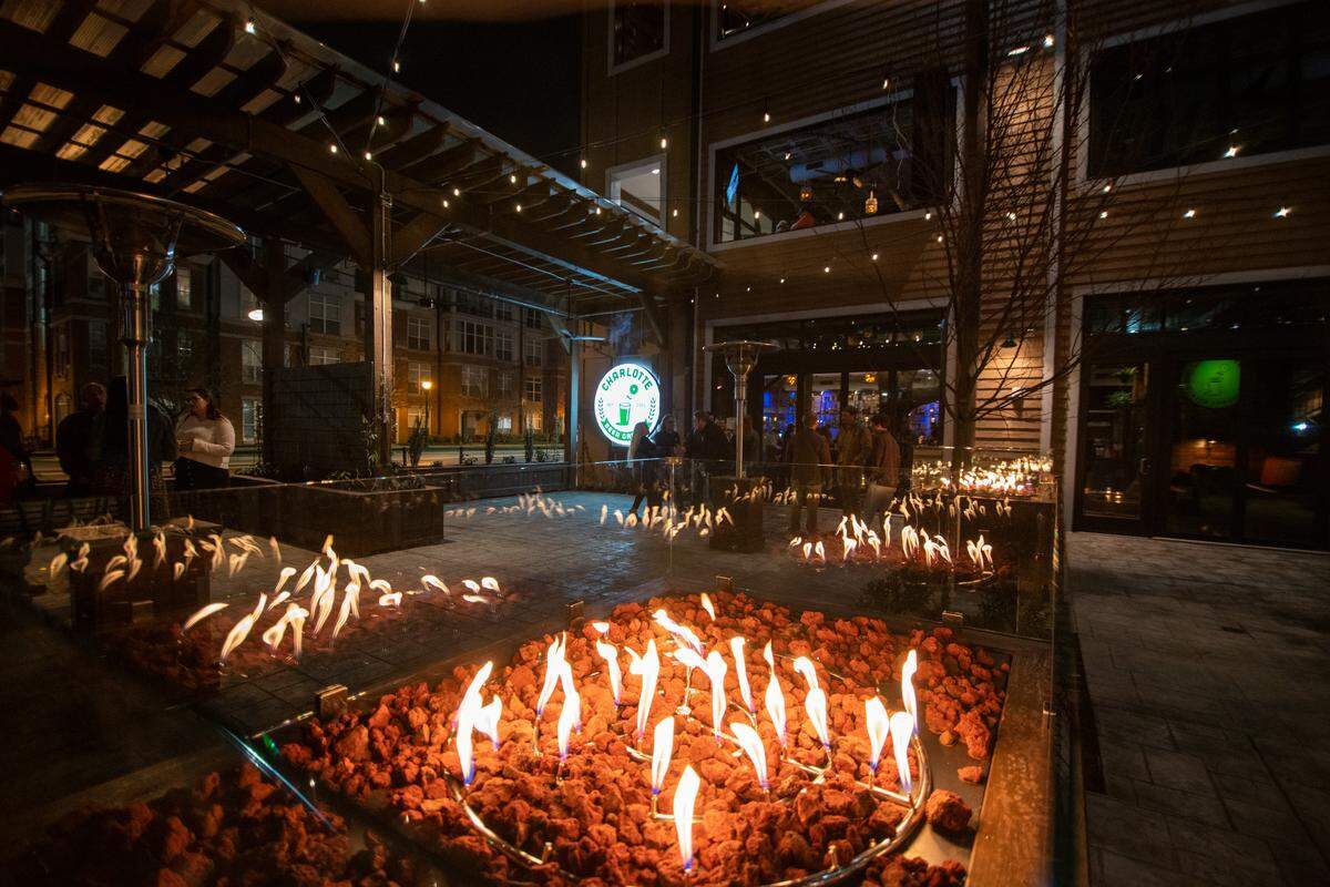 The Charlotte Beer Garden has plenty of firepits and gas heaters to keep the patios warm.