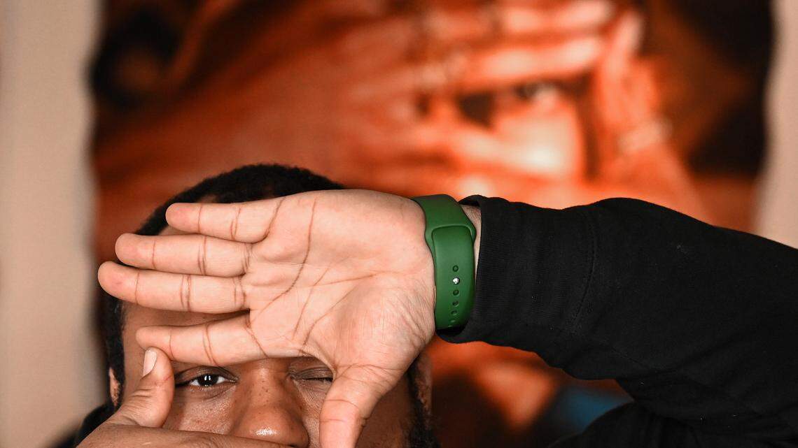 Local artist Will “Sir Will” Jenkins strikes a pose similar to his photograph titled “Block.” Jenkins is a “catalyst artist-in-residence” at McColl Center in Charlotte.