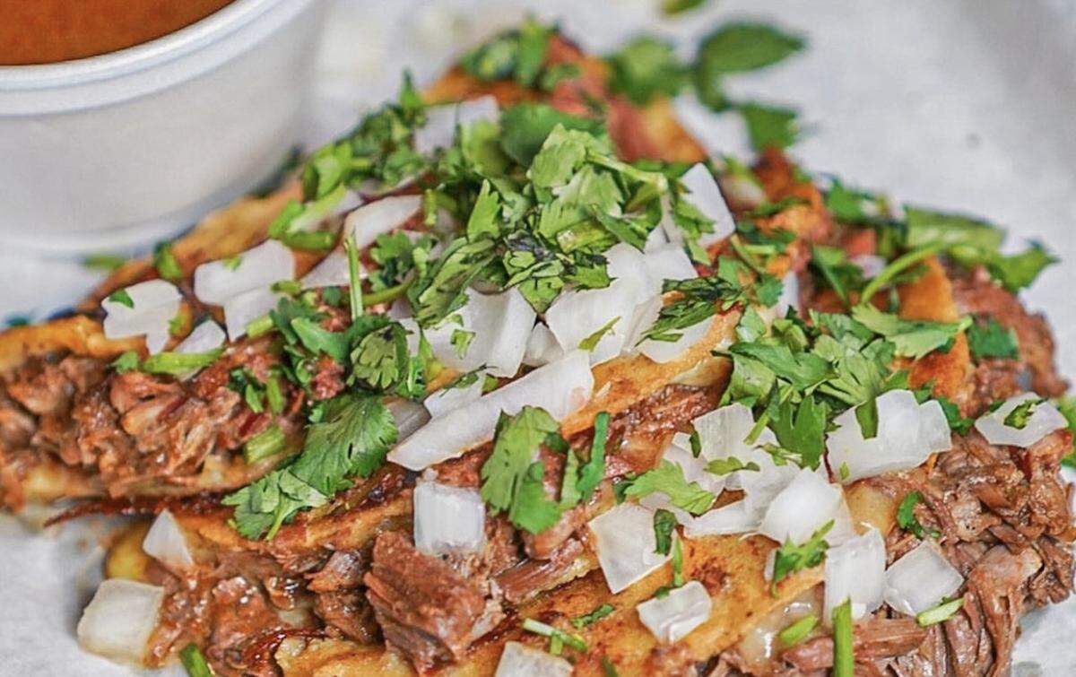 Talkin’ Tacos’ beef birria tacos are made on corn tortilla with Chihuahua cheese, onions and cilantro.