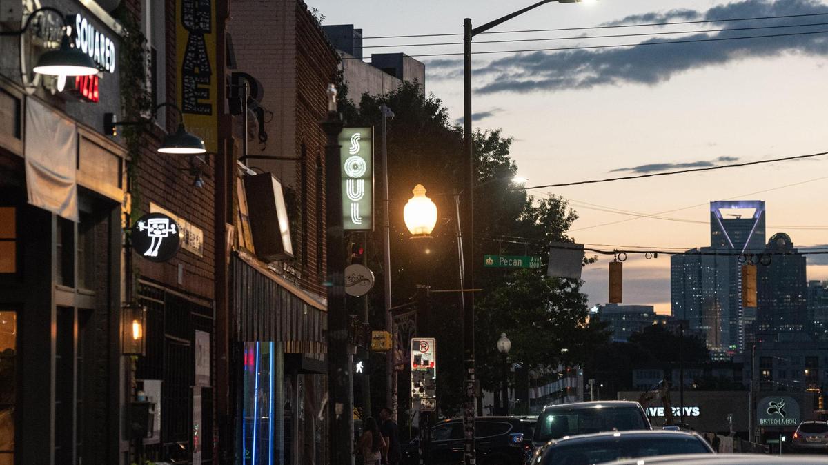 A view of the uptown skyline at sunset from Plaza Midwood on Monday evening, Aug. 8, 2022 in Charlotte, N.C.