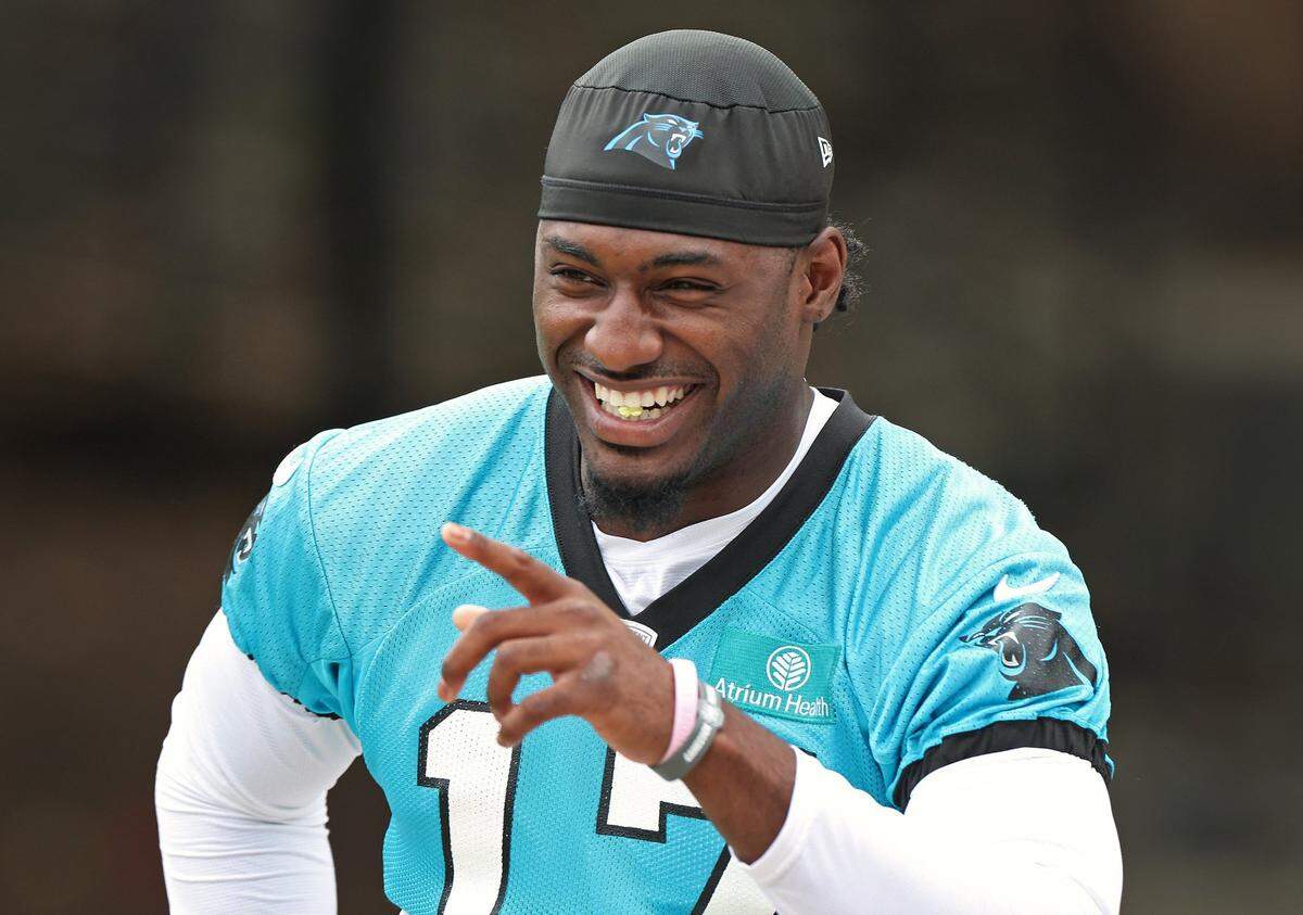 Carolina Panthers wide receiver Xavier Legette smiles as he walks to the team’s OTA practice on Tuesday, June 4, 2024.