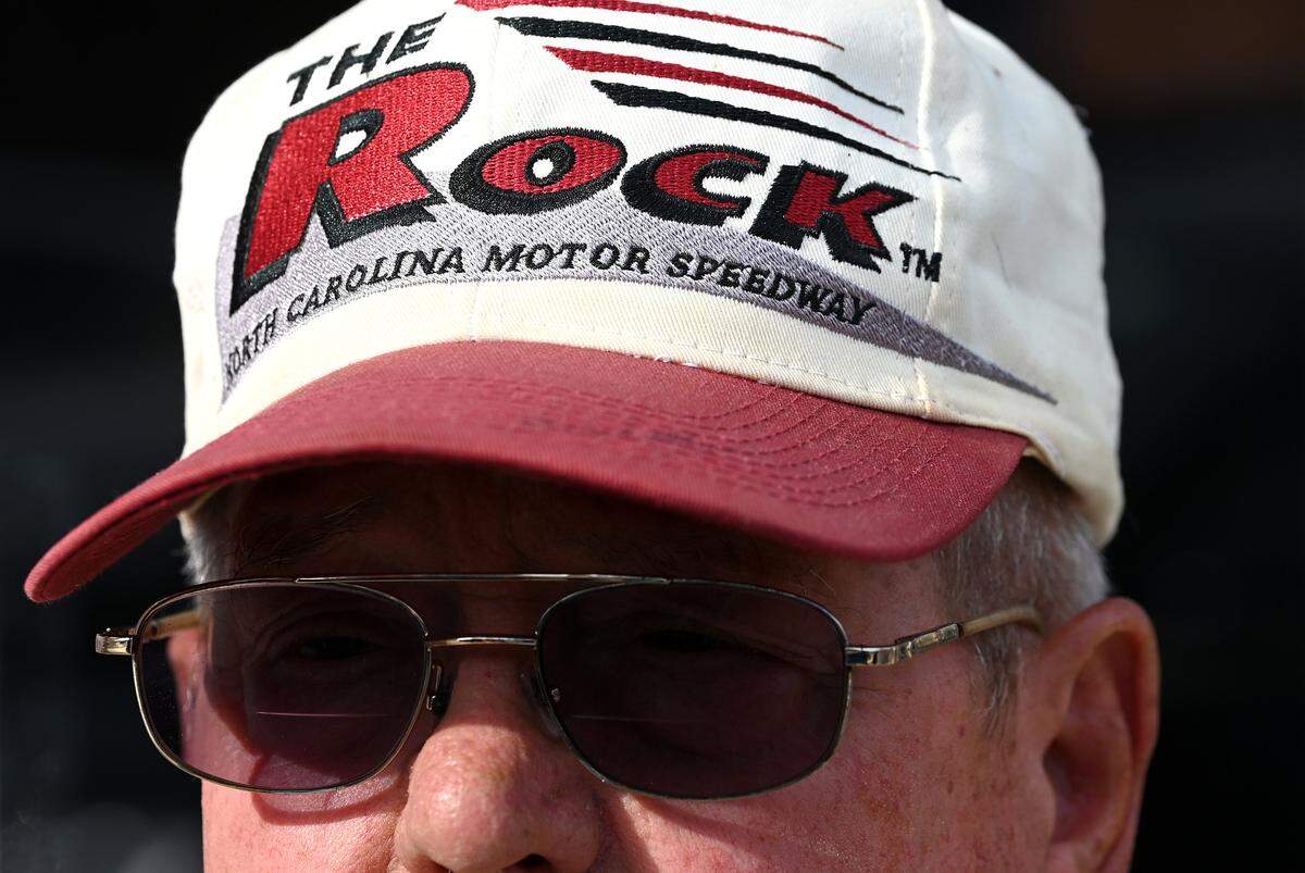 NASCAR fan Donnie Cobbler of Ellerbe, NC has stored his The Rock hat away for years just waiting for the return of NASCAR to Rockingham Speedway and this weekend Craftsman Truck and XFINITY Series action returns to the storied track. Cobbler attended Thunder Fest in downtown Rockingham on Thursday evening that featured former NASCAR drivers Kenny Wallace and Ken Schrader along with NASCAR Craftsman Truck Series and XFINITY Series drivers.