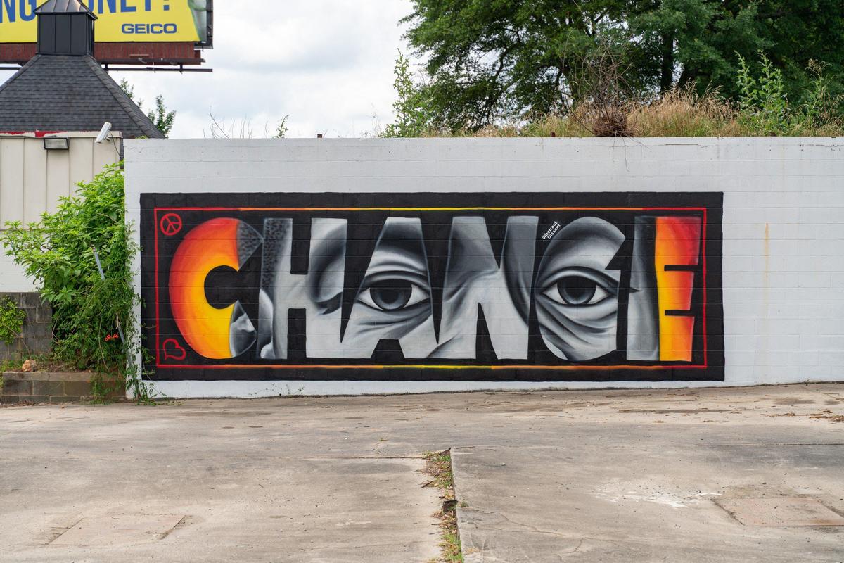 This mural by Shane Pierce is in West Charlotte on Brookshire Boulevard.