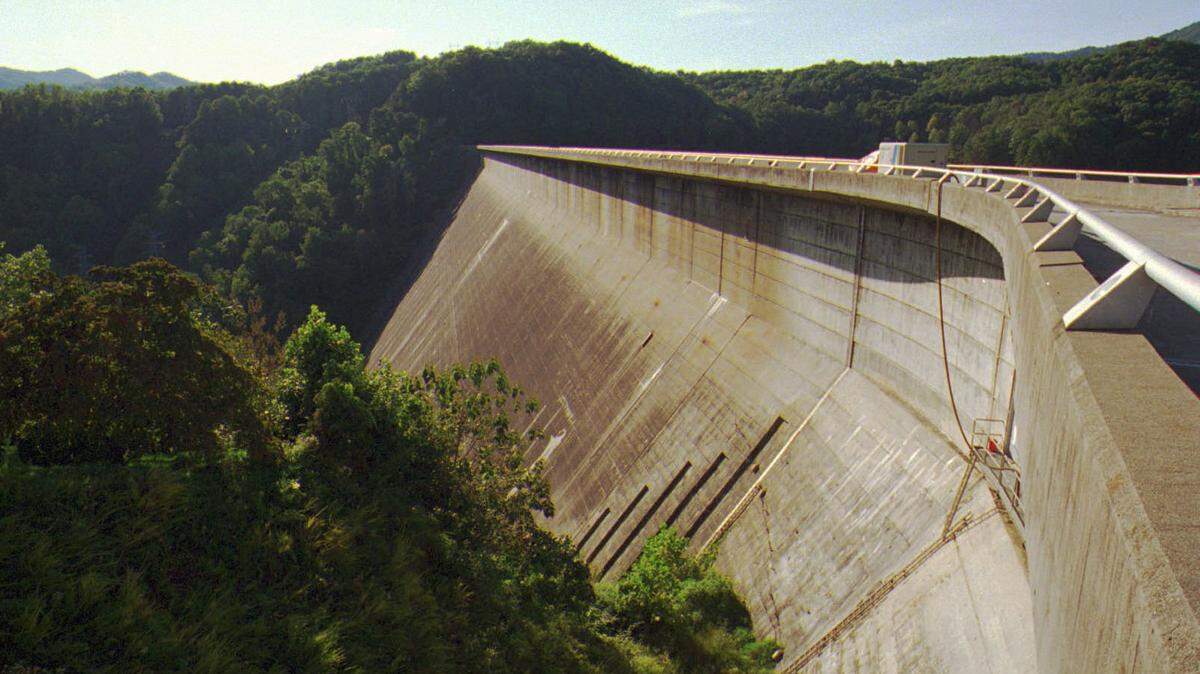 The Interior Department has paid $35.2 million to Swain County, completing an obligation to the N.C. mountain county that dates to 1943. The government had promised to compensate the county for roads and land flooded by construction of Fontana Dam, shown here.