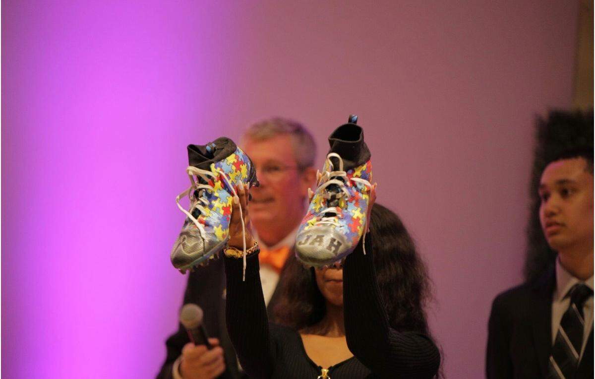 Carolina Panthers tight end Ian Thomas auctioned off his “My Cause, My Cleats” game cleats to benefit Autism Charlotte this spring.