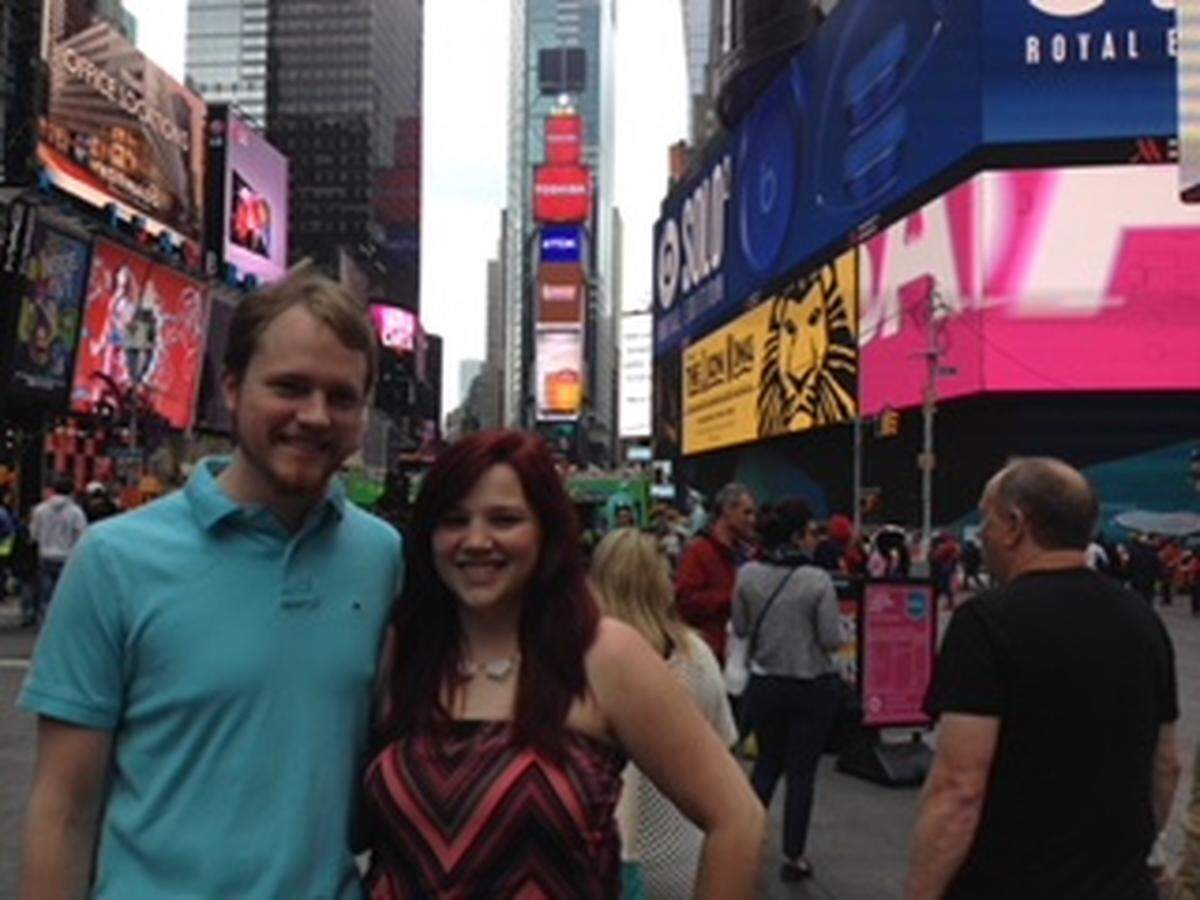 Amanda Bledsoe and Andrew Pippin visiting Times Square in New York City in 2015, in the heart of the theater district.