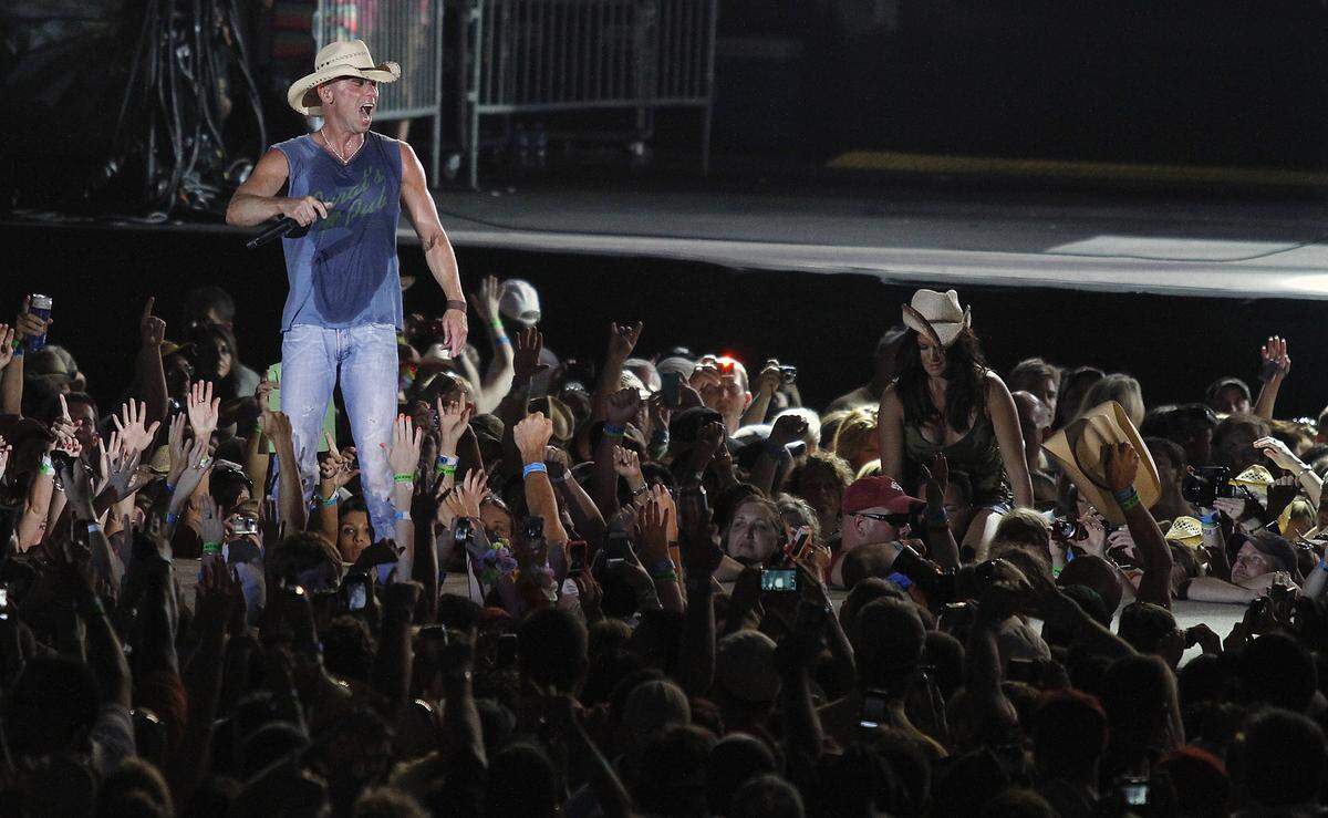 Country music star Kenny Chesney performed at Bank of America Stadium in 2012. Chesney returns to the stadium on April 27.
