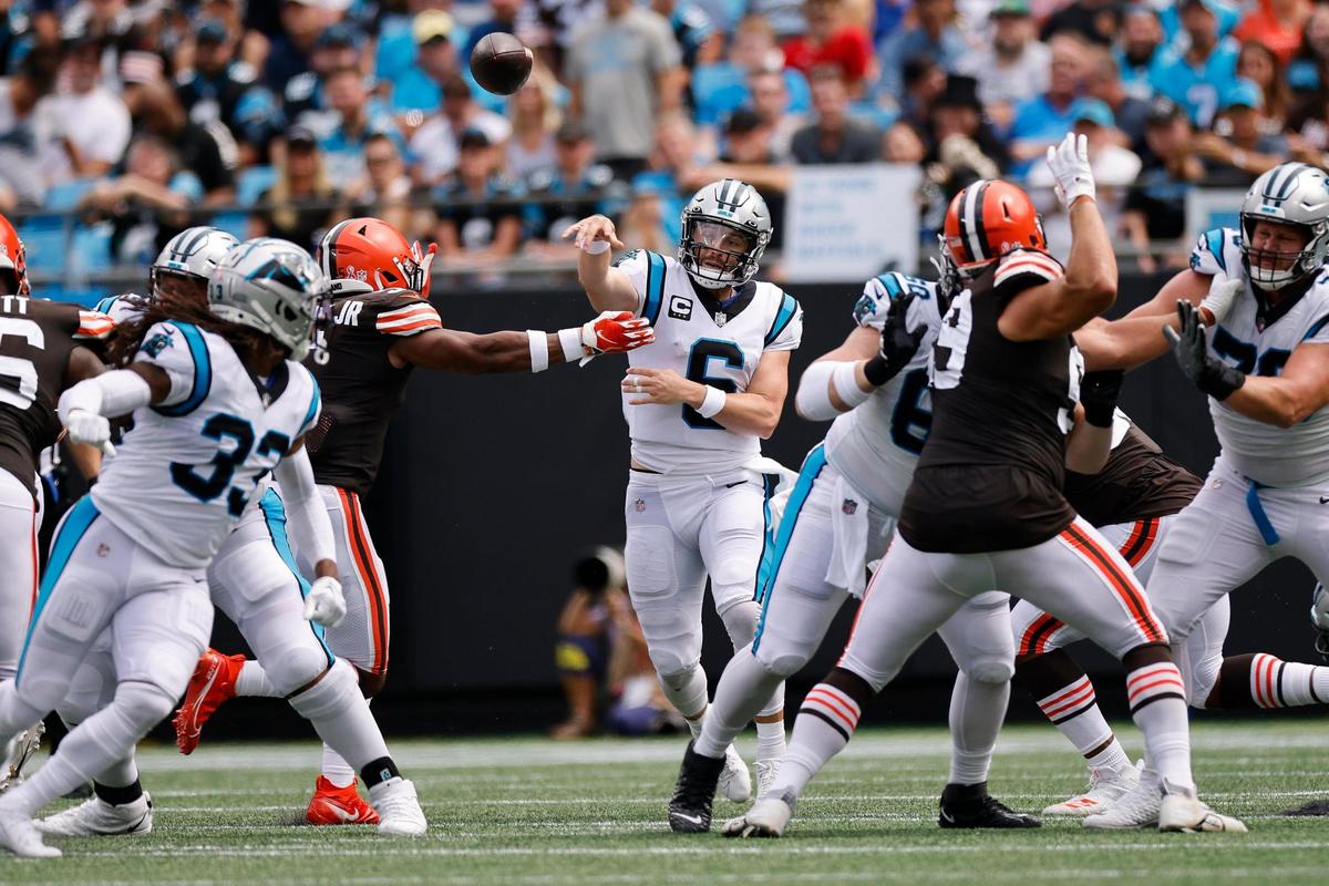 Carolina Panthers quarterback Baker Mayfield (6) got this pass off without a problem, but five of his throws were tipped at the line against the Cleveland Browns.
