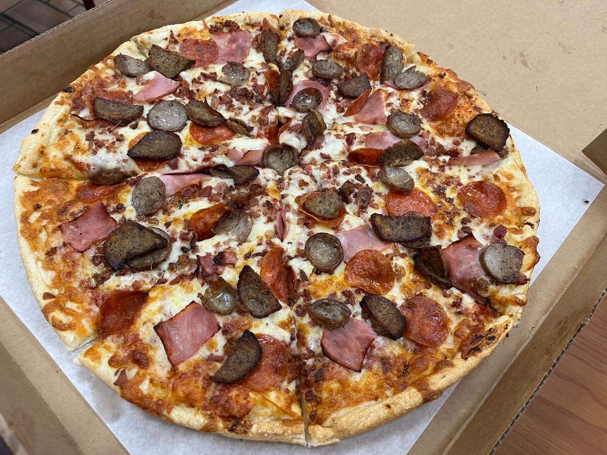 The Meatlover’s Delight pizza at Athens Pizza & Kabobs includes pepperoni, sausage, meatball slices, ham and bacon.