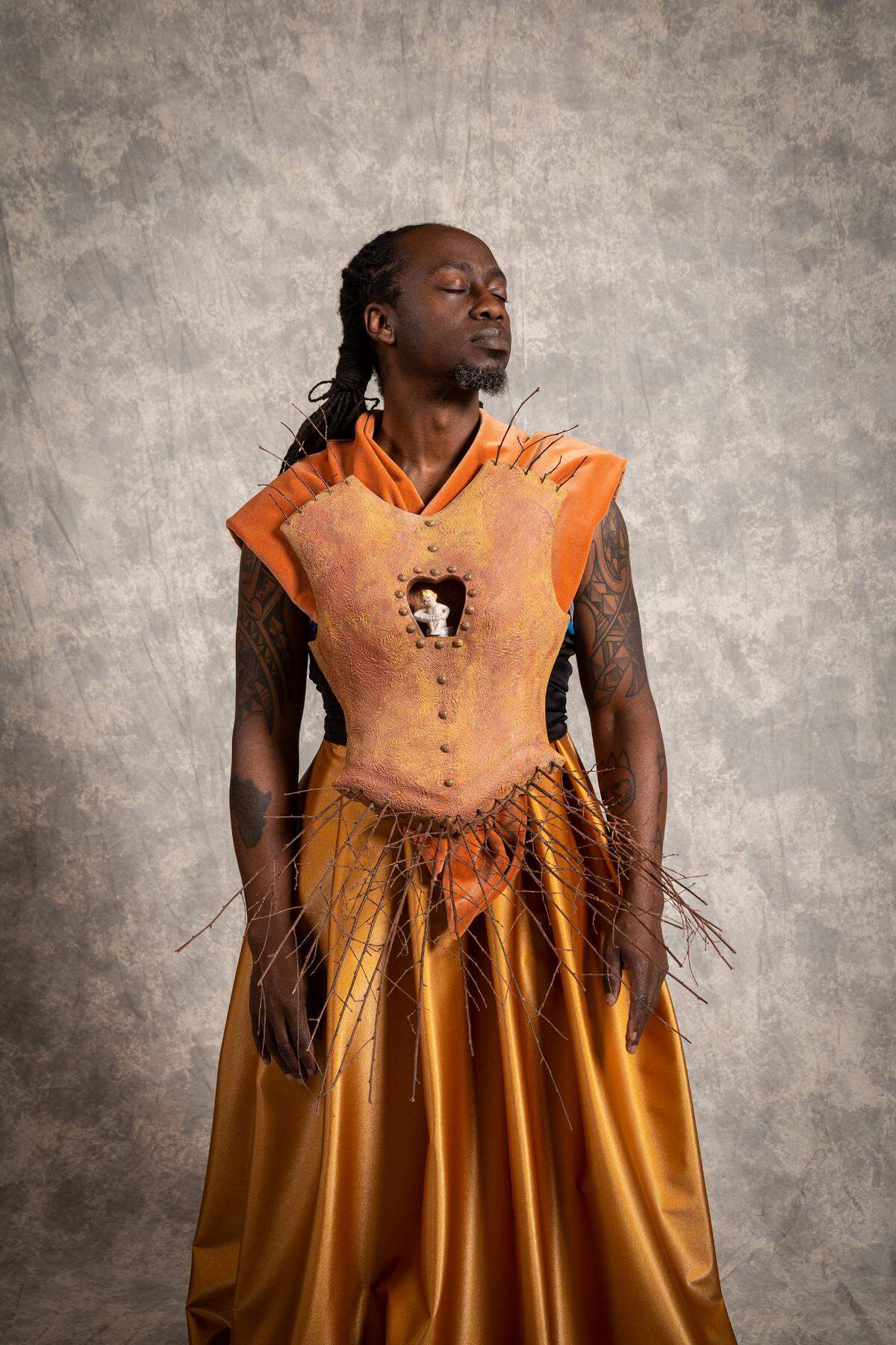 Charlotte artist de’Angelo Dia as he appeared in a piece called “Armor.” Dia said the artwork, by Betsy Birkner, was about “the fragile nature of life and the assault on Black and Brown people.”