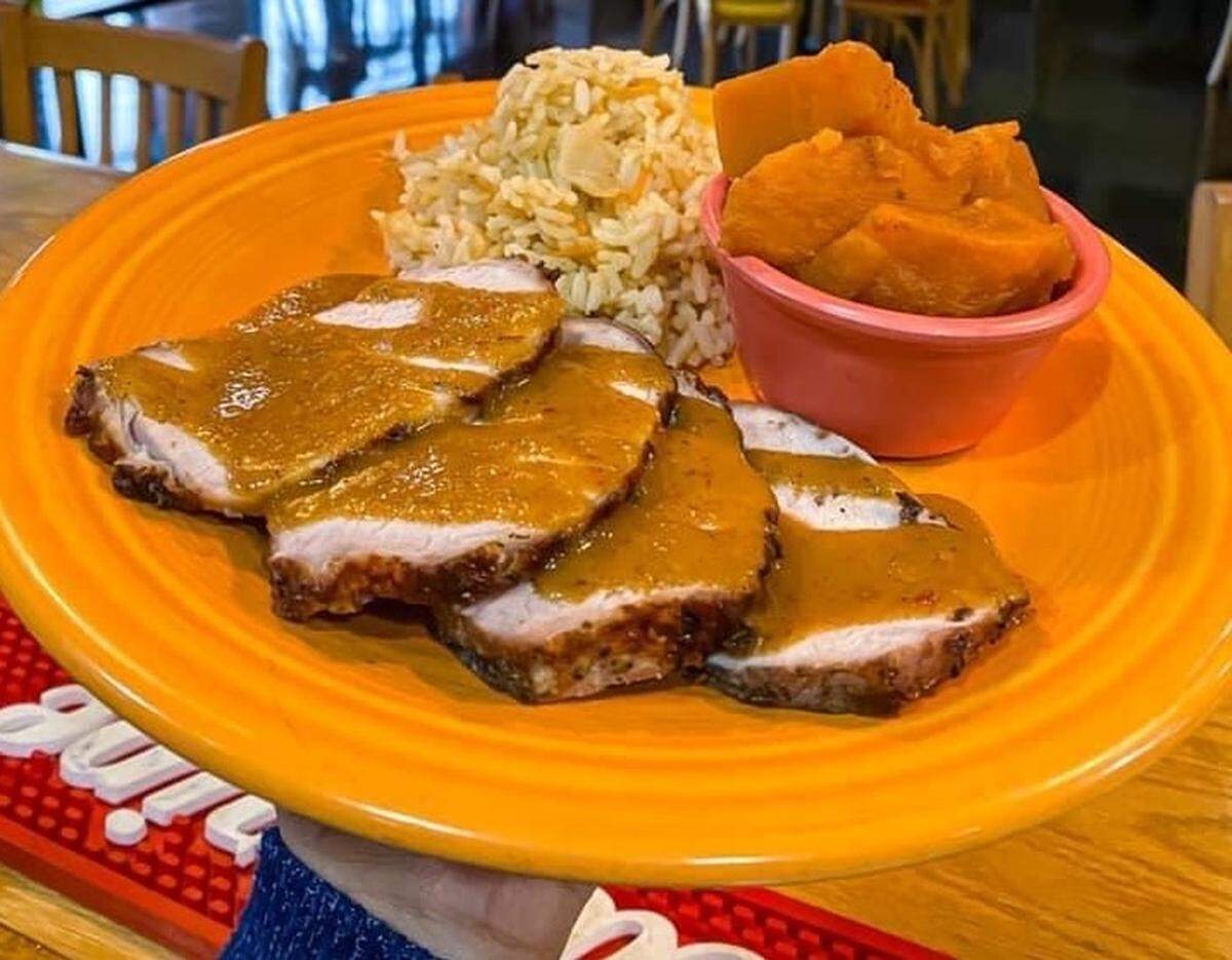 Anntony’s pork chops with Calypso rice and yams.