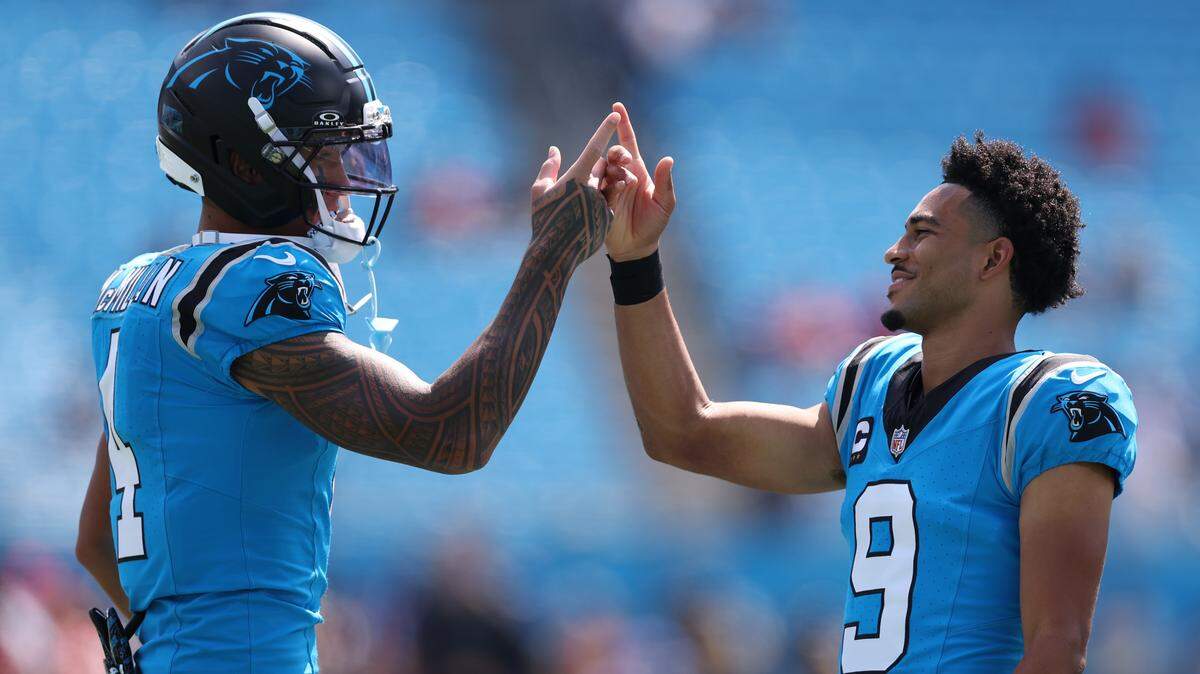 Carolina Panthers quarterback Bryce Young (9) and wide receiver Tetairoa McMillan (4) greet each other before their Week 3 30-0 win over the Atlanta Falcons. McMillan has quickly become Young’s favorite receiver, leading the team in receiving yardage in all three games.