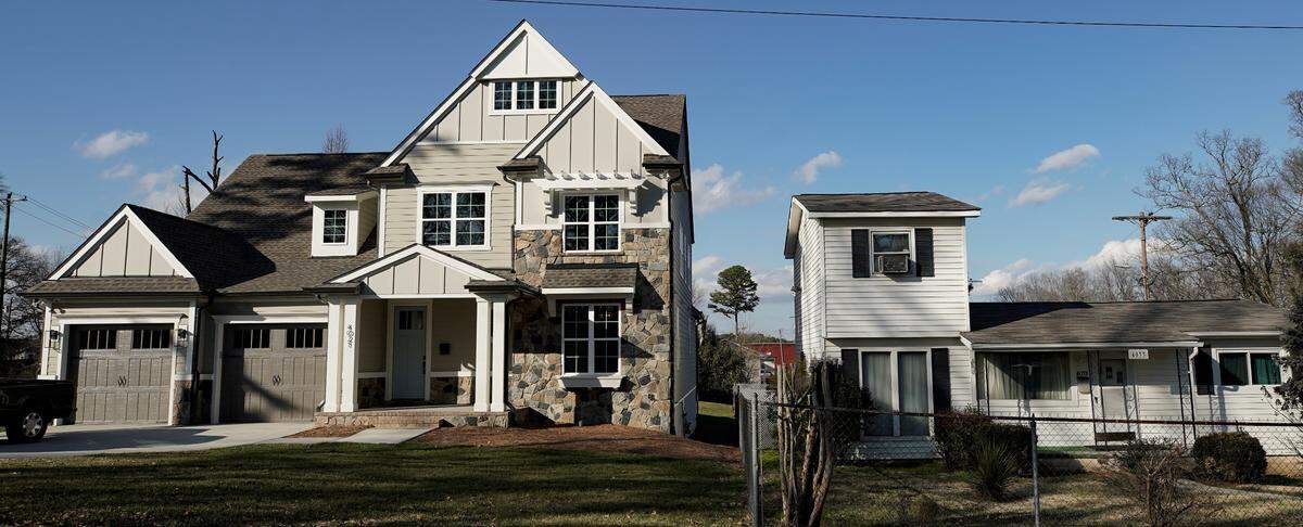 Developers have started to construct large homes in Howie Acres, which residents worry will detract from the character of their neighborhood.