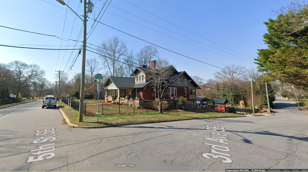 Multiple neighbors called 911 and reported a man was standing on his porch, firing shots at passing vehicles, Hickory police say.