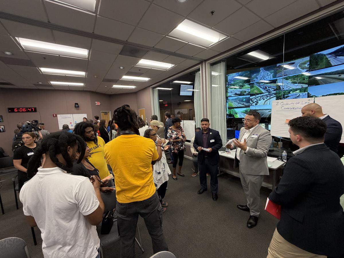 Residents gather for a listening session on the Interstate 77 South toll lane project. Some residents felt more informed after the community meetings. Others remain skeptical of how the project will benefit Charlotteans.