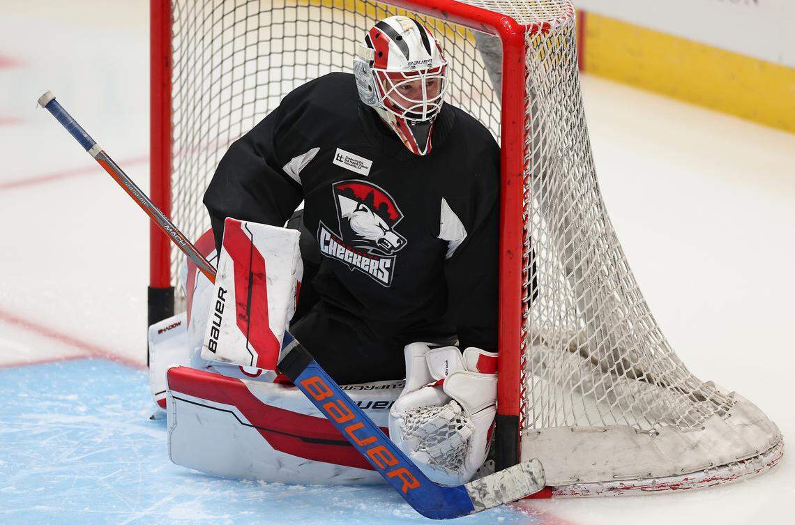 Charlotte Checkers goalie Ken Appleby watches play to his left from the net during practice at Bojangles Coliseum in Charlotte, NC on Tuesday, October 15, 2024. The Checkers will play their first two home games against the Cleveland Monsters on Friday, October 18th and Saturday, October 19th.