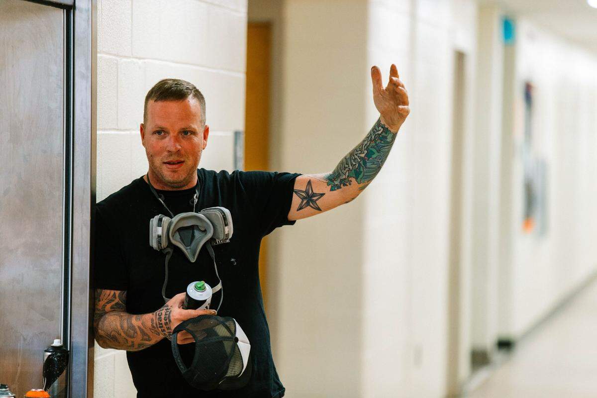 Shane Pierce, who paints under the name Abstract Dissent, uses high-end European spray paint and special spray paint caps to create the effects he needs for his murals.