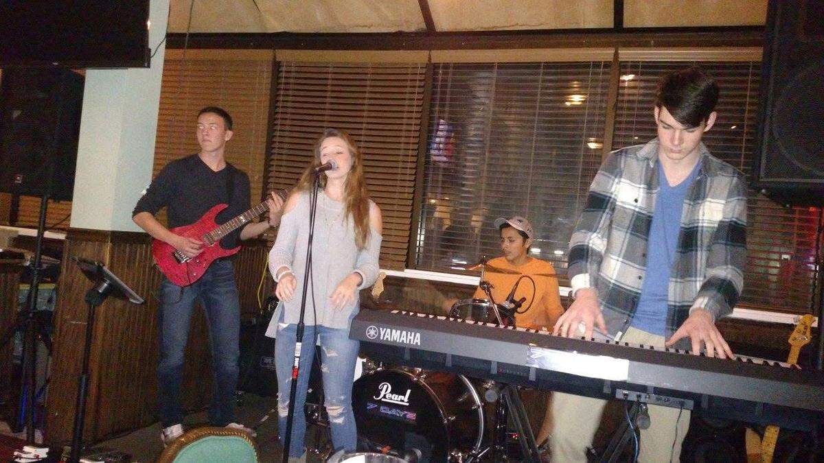 One of our Brooke Lee’s first gigs ever, at the old Lake Town Tavern in Cornelius. With her, from left, Logan Foland, Christian Sturt, and Christopher Law.