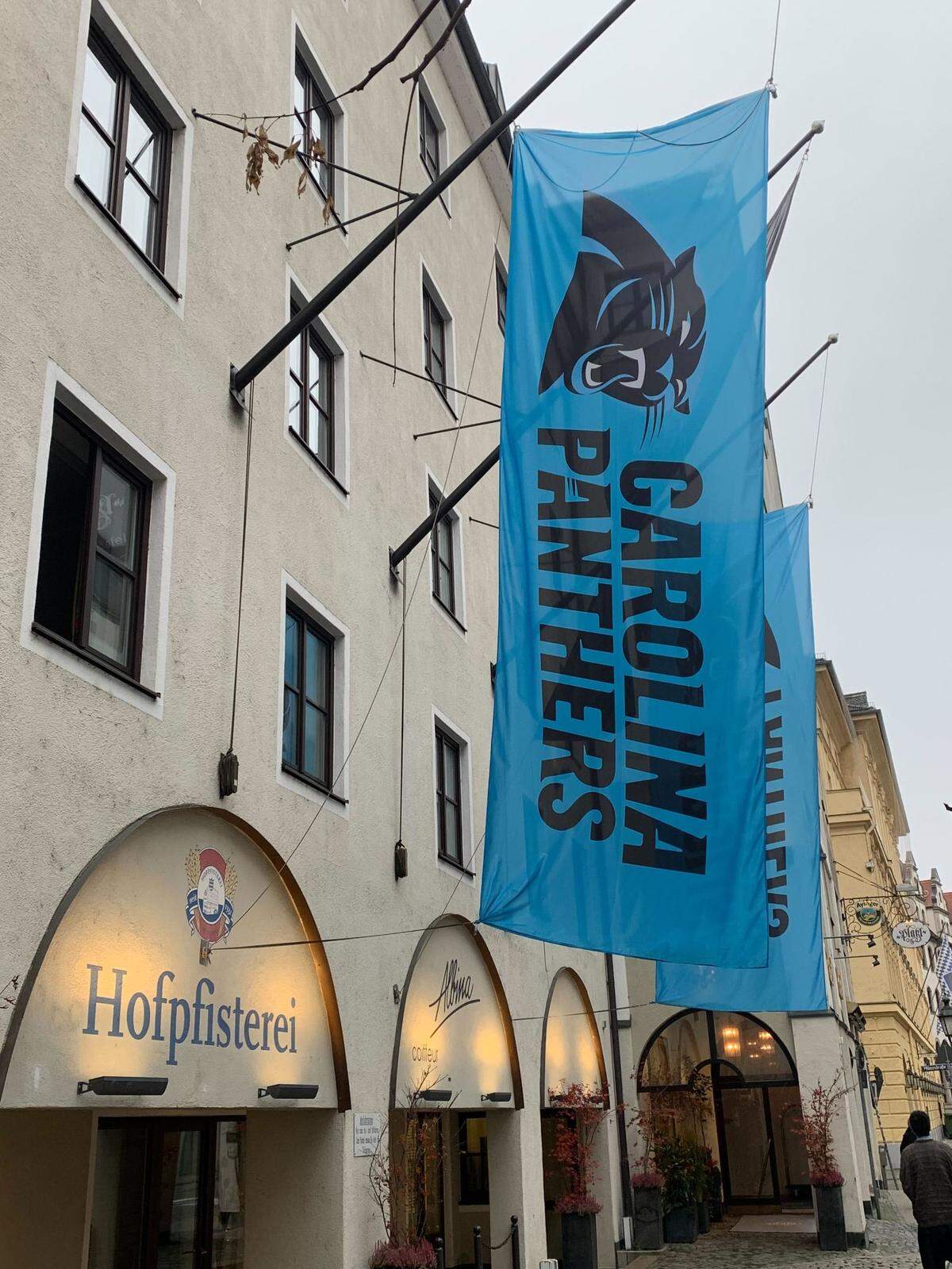 Carolina Panthers flags are hung in front of a bar in Munich, Germany ahead of the team’s Week 10 matchup against the New York Giants.