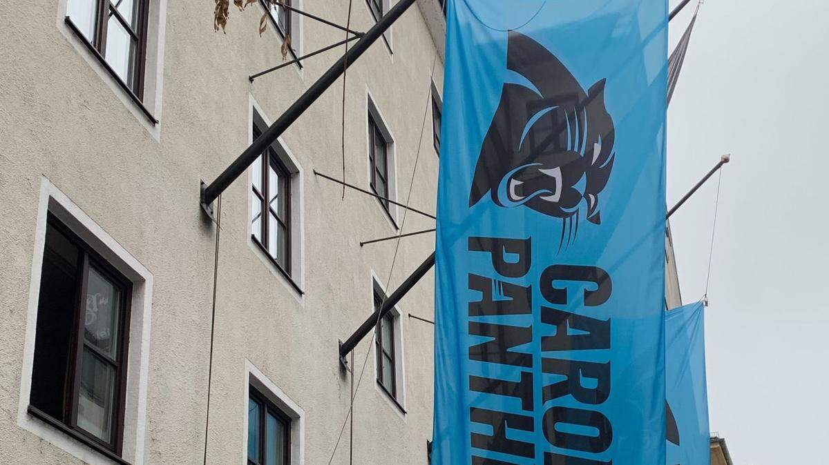 Carolina Panthers flags are hung in front of a bar in Munich, Germany ahead of the team’s Week 10 matchup against the New York Giants.