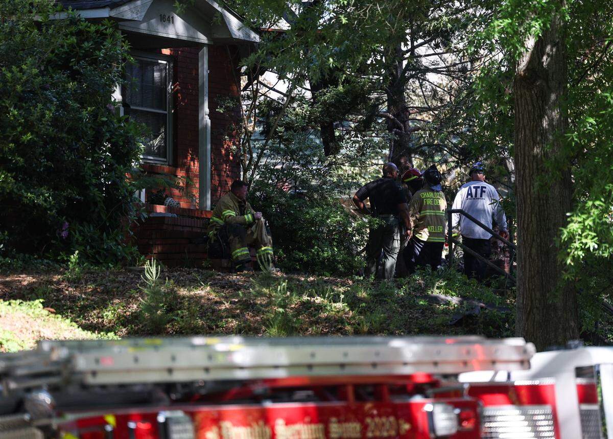 Firefighters at the scene of the May 2 home explosion.