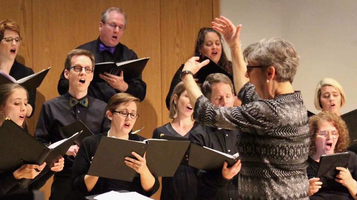 Director Donna Hill leads the Carolina Voices Festival Singers. The Festival Singers Nov. 16-17 concert, “Courage: Heroes and Legends,” features a program of music that honors heroes and heroines you know and some you’ve never heard of.