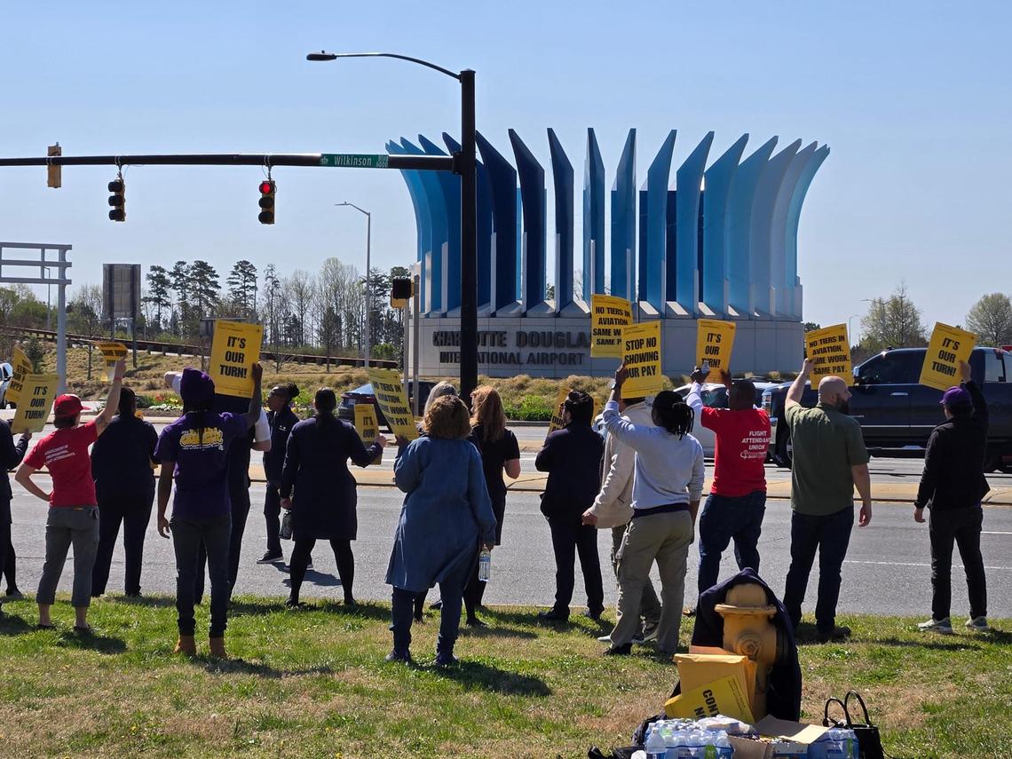 The Association of Flight Attendants-Communications Workers of America led a protest outside of Charlotte’s airport on Wednesday.