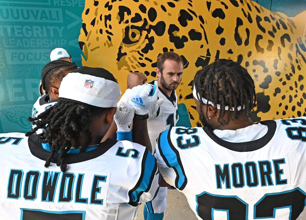 Carolina Panthers wide receiver Hunter Renfrow, center, joins his teammates in the tunnel prior to their game against the Jacksonville Jaguars on Sunday, September 7, 2025 at Everbank Stadium in Jacksonville, Florida.