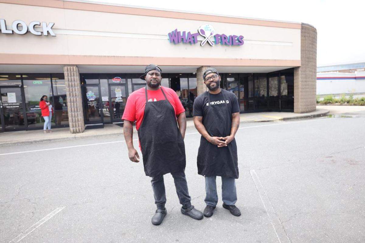 Jamie Barnes, left, and Gregory Williams are chefs and co-owners at What The Fries.