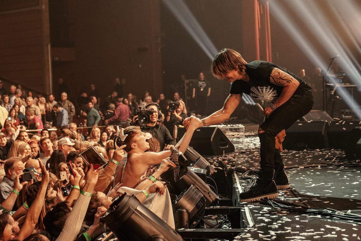“Playing live is what I live to do,” Keith Urban says.