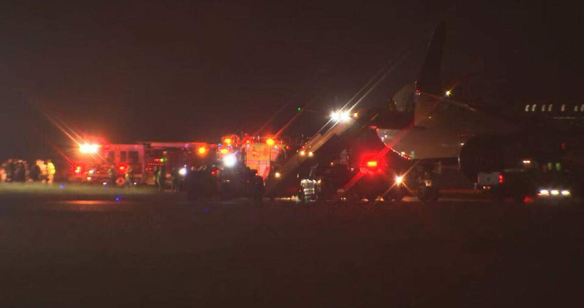A Delta flight with Carolina Panthers players slid off the taxiway early Friday at Charlotte Douglas International Airport.