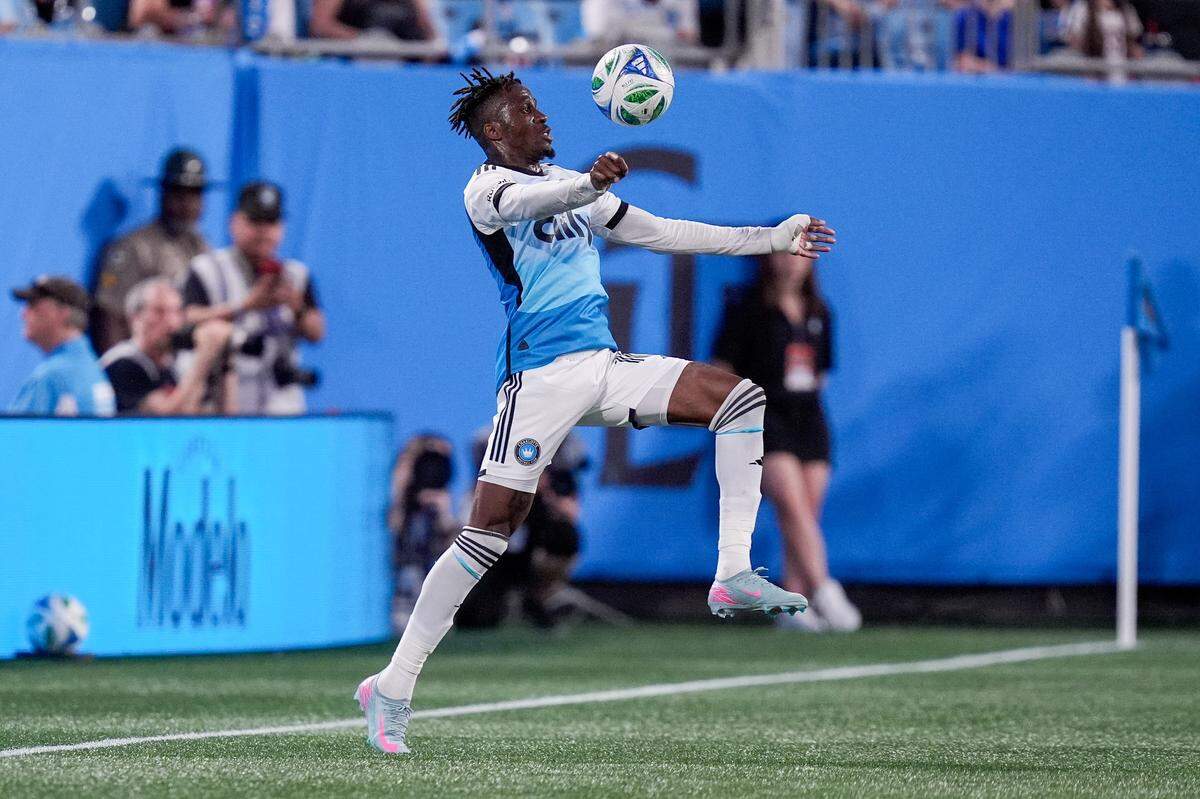 Charlotte FC forward Wilfried Zaha (10) chests the ball during the first half against the New England Revolution on Saturday at Bank of America Stadium. Jim Dedmon-Imagn Images