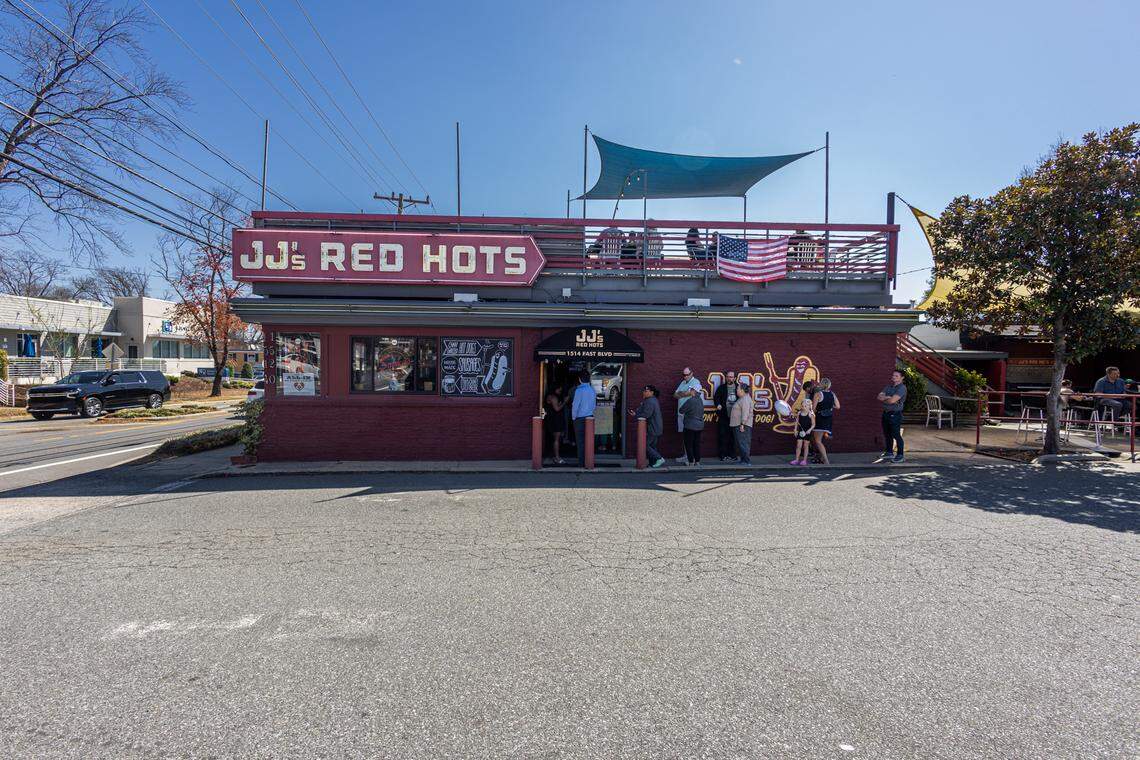 A line forms outside of JJ’s Red Hots on East Boulevard in Charlotte on Wednesday, March 12, 2025. The restaurant will close its doors on Sunday, March 16.