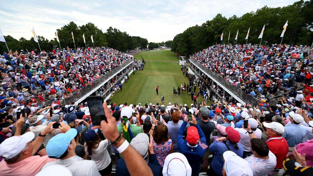 Fans cheer as team US tee off on the final day on the Presidents Cup at Quail Hollow Club on Sunday, Sept. 25, 2022 in Charlotte, NC.