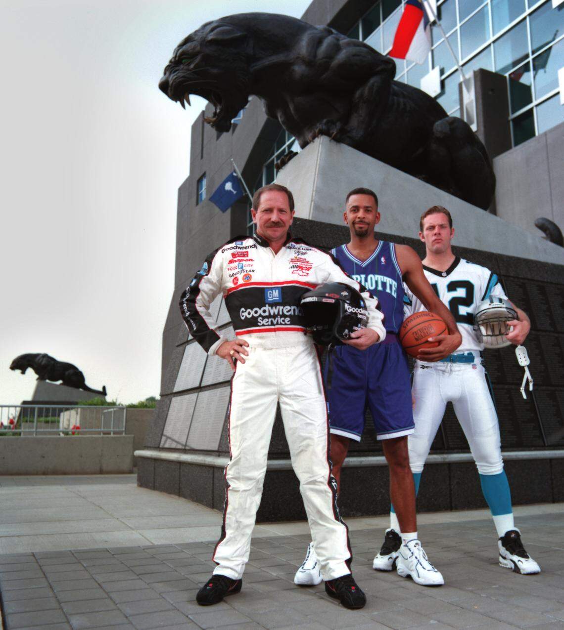 In 1996, Dale Earnhardt (left) joined the Charlotte Hornets’ Dell Curry (center) and Carolina Panther quarterback Kerry Collins for a photo shoot for The Charlotte Observer at what was then known as Ericsson Stadium.